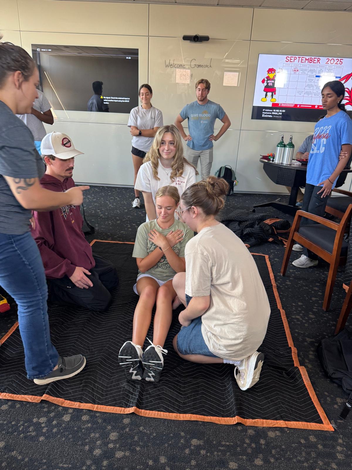 Students practicing patient assessment skills